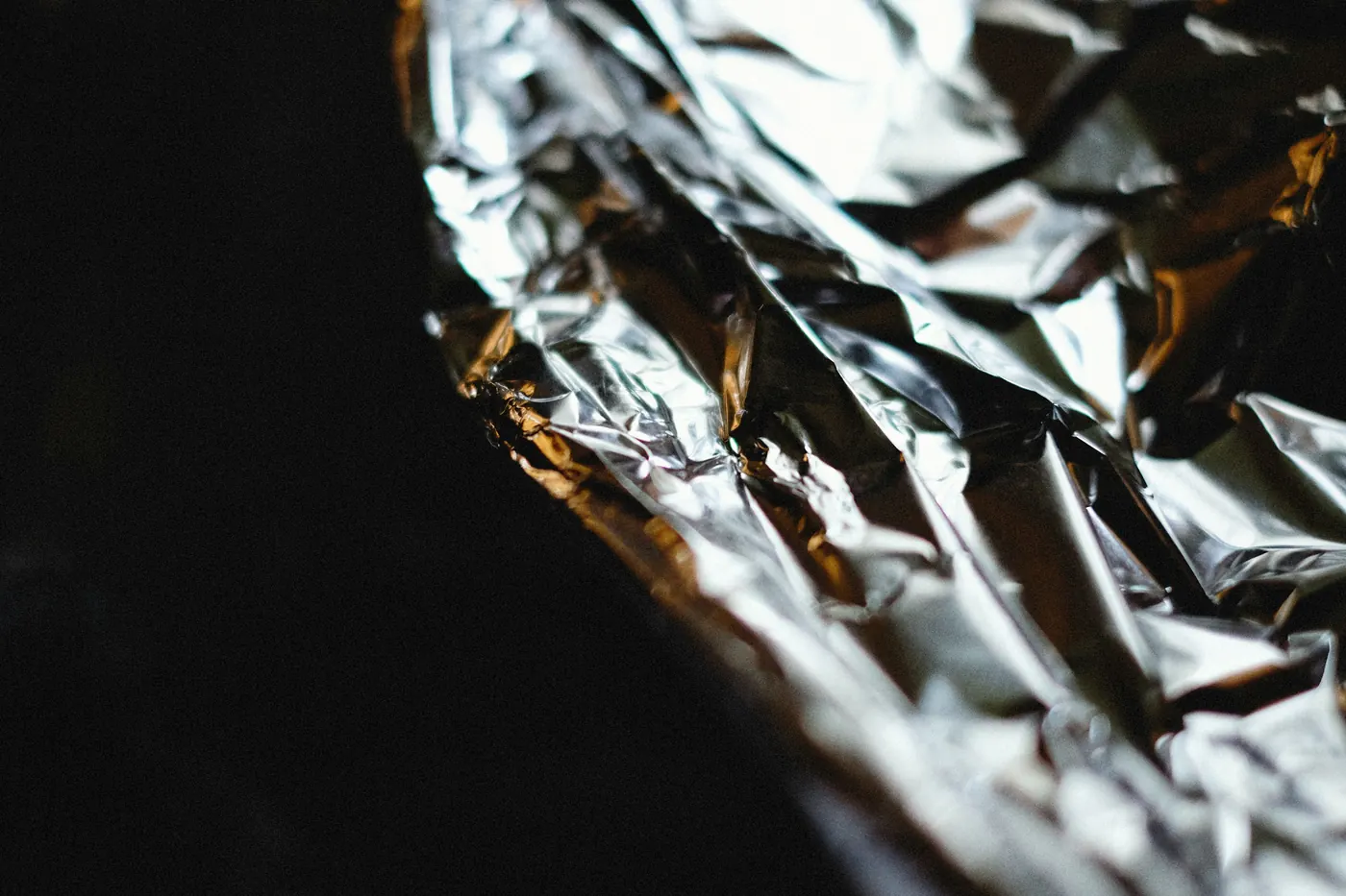 A close view of crumpled aluminum foil