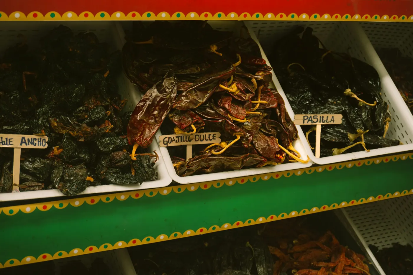Trays of dried grasshoppers for sale at a market stall